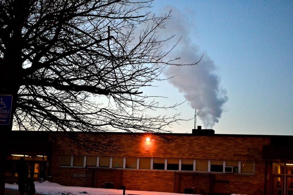 On cold mornings, dark grey smoke, produced by the burning of fossil fuels, can be seen rising above East’s roof.