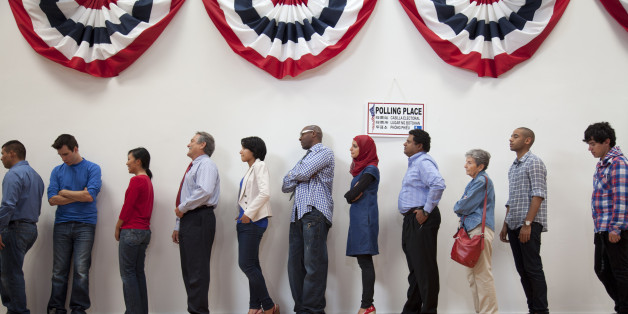 Voters+waiting+to+vote+in+the+polling+place