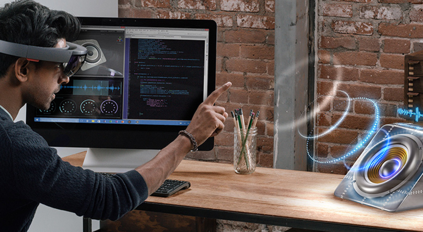 The HoloLens mixes reality with the virtual world. 