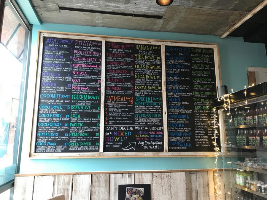 Playa Bowls colorfully displays the menu on a chalkboard.
