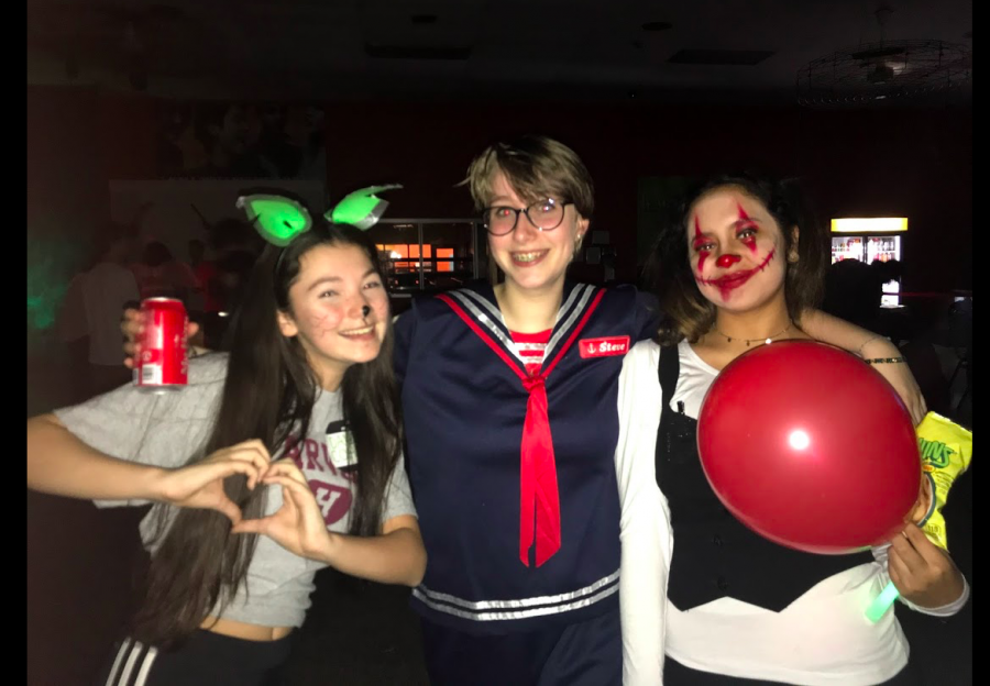 East students gather together to celebrate Halloween with an array of costumes, music, and festivities