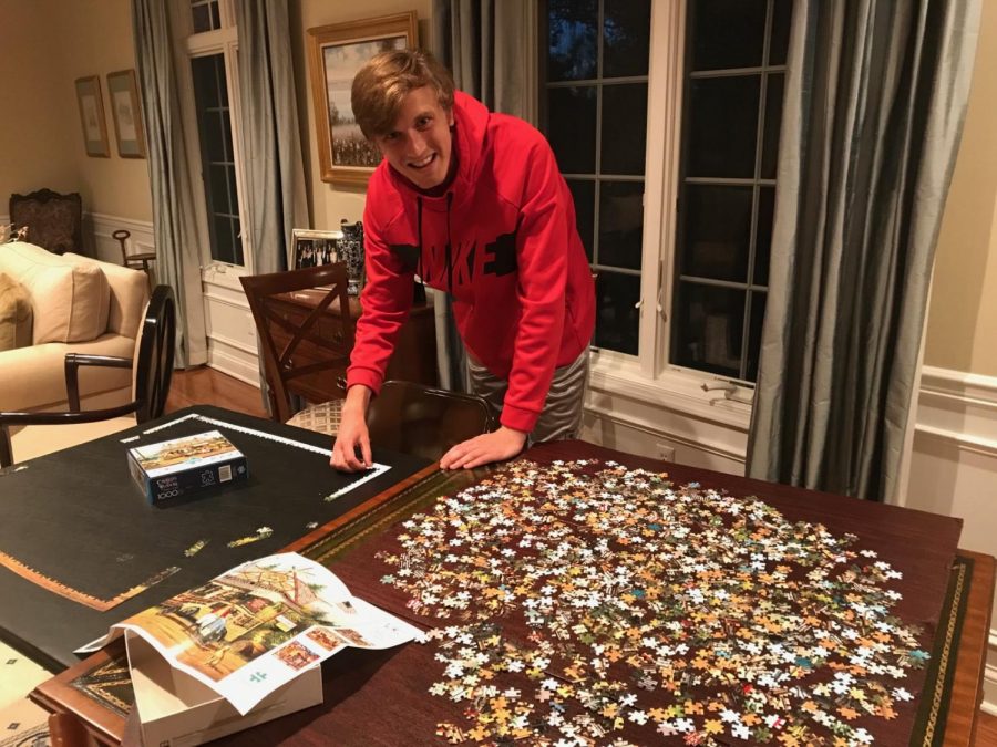 Oliver Adler (20) having fun with a puzzle during social distancing.