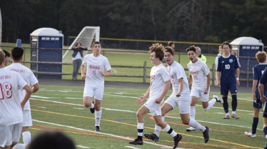 Senior+Hank+Feudtner+celebrates+with+his+team+after+scoring+a+goal+vs.+Shawnee+on+Tuesday.