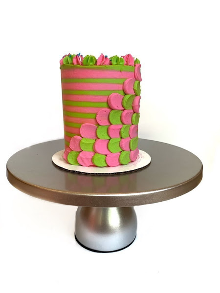 Jillian made a striped pink and green cake filled with chocolate buttercream. 