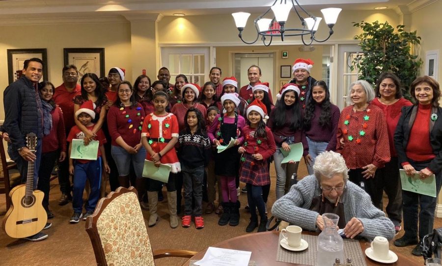 Last year, Nicole Vital (‘22) and about seven other families sang carols at the Atria senior living center in Cherry Hill.