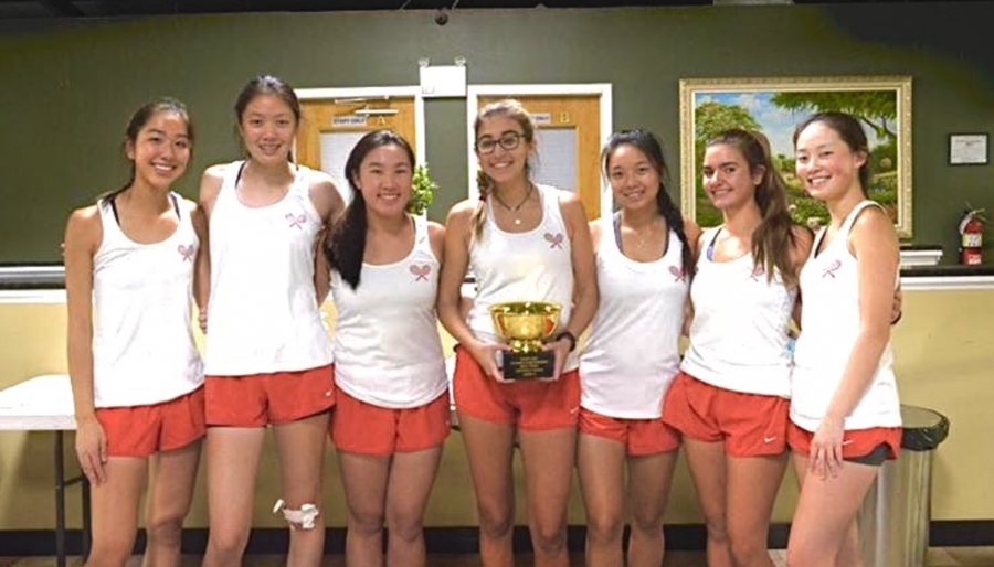 The girls tennis team is very proud of the season they had.