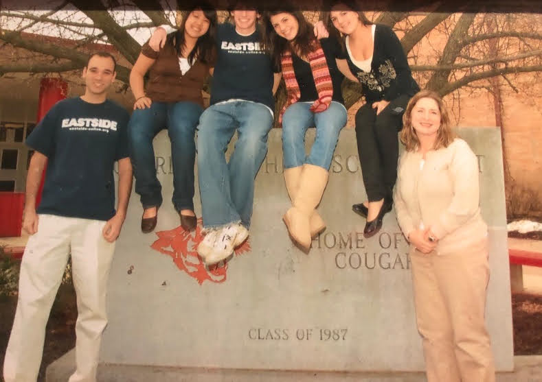 The advisers and officers of the senior Class of 2008 pose for a picture with the symbolic stone.