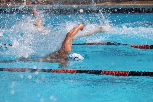 Nick Pezzella swimming in a meet