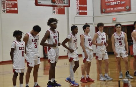 Cherry Hill East basketball team lines up before the game
