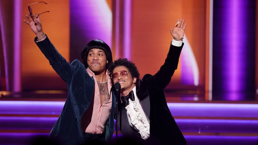 Anderson-.Paak-and-Bruno-Mars-of-Silk-Sonic-accept-the-Record-Of-The-Year-award-for-%E2%80%98Leave-The-Door-Open-onstage-during-the-64th-Annual-GRAMMY-Awards-Getty-H-2022