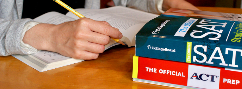 High school students use textbooks with tutors to prepare for college tests and essays.