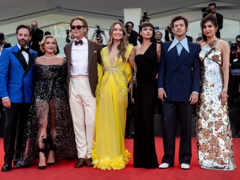 The cast of Dont Worry Darling poses for a photo at the Venice Film Festival. 