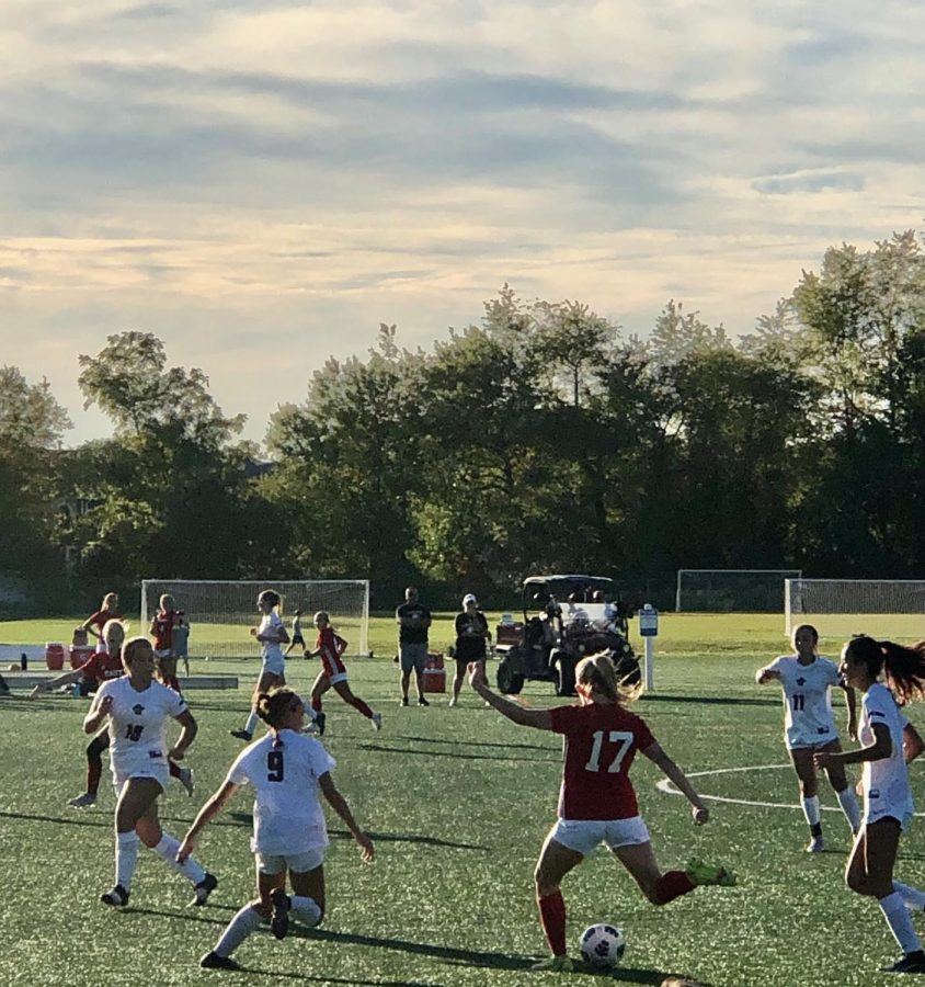 The Cougars girls soccer team battles Cedar Creek.