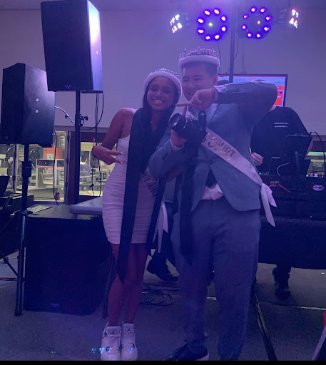Uma Mawrie and Lucas Tang win Homecoming King and Queen 2022. 