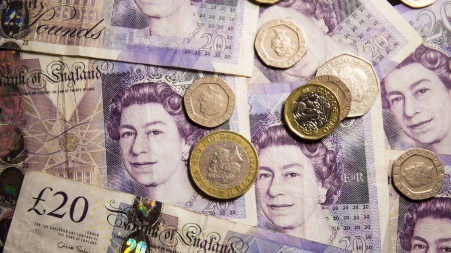 British pounds bearing the face of Queen Elizabeth II. All must be recirculated with the face of the newly minted King Charles. (Courtesy of ABC News)