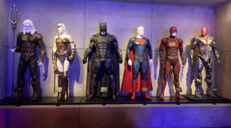 The costumes of all the DC superheroes, including the names of the actors or actresses who wore them, are displayed on the walls, Molly Grossman (25).