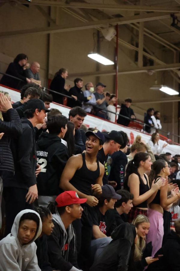 Siddarth Pejavara (23) [located in the center of the picture] tries his hardest to improve School Spirit and bring everyone together, especially at Basketball games. 