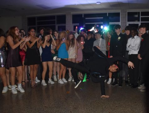 Students crowd the dance floor and show off their dance moves at Frosh.
