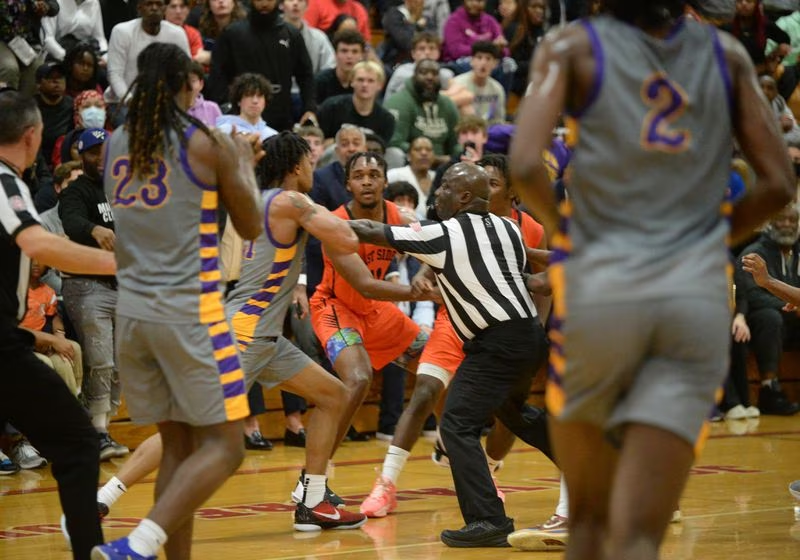 A brawl between Camden and Camden Eastside breaks out during the Camden County tournament championship game.