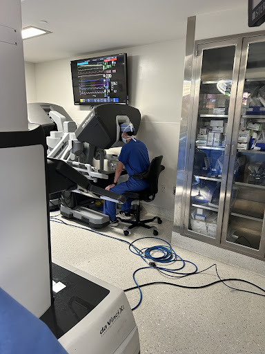 Me looking through the surgeon’s console of Da Vinci Xi performing a coronary artery bypass graft at Penn Presbyterian Medical Center 
