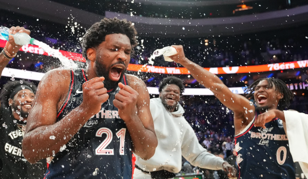 Philadelphia 76ers center, Joel Embiid, celebrates with his teammates on Monday, Jan. 22, after scoring a career high 70 points against the San Antonio Spurs. Embiids historic milestone surpassed the 68-point franchise record held by Naismith Memorial Basketball Hall of Fame center, Wilt Chamberlain. 