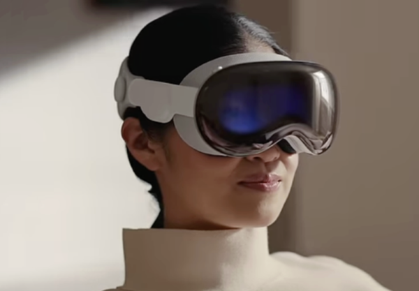The Apple Vision Pro placed around a persons eye allowing them to see virtual reality. 