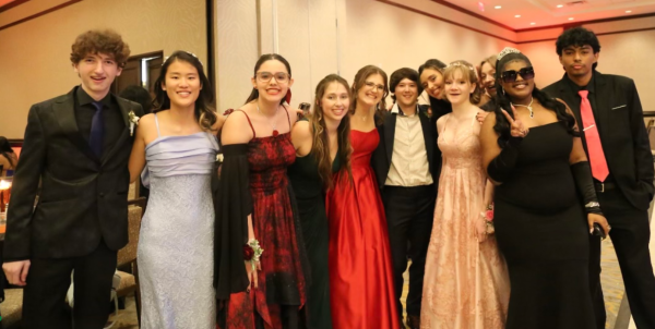 Students attending junior prom at The Westin Hotels & Resort pose for a photograph. 