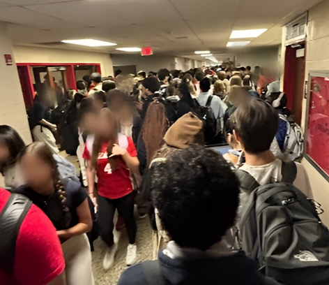 Cherry Hill East students and teachers struggle to navigate a crowded C-Wing intersection in between class periods