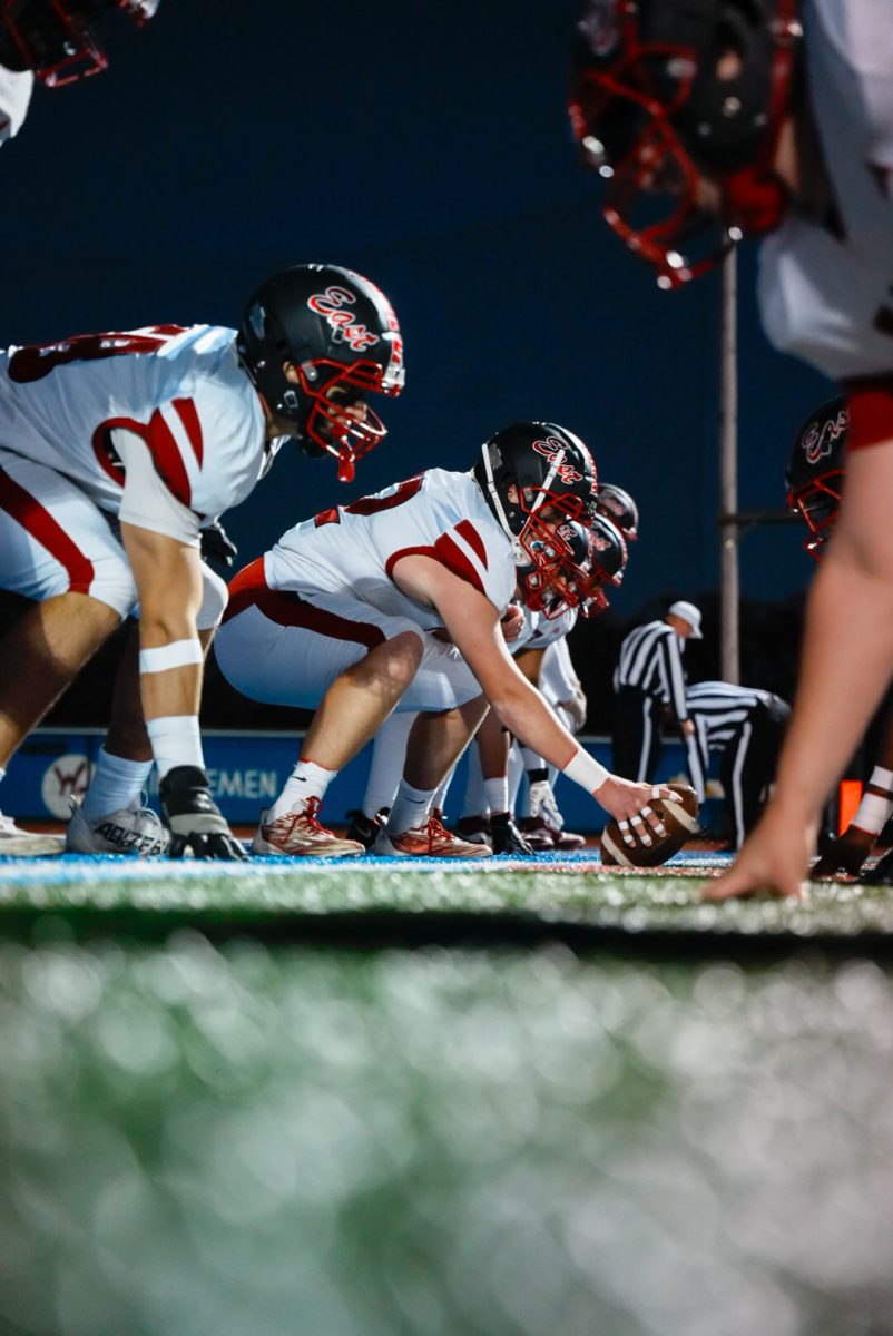 Cougars lining up and waiting for the ball to get snapped.