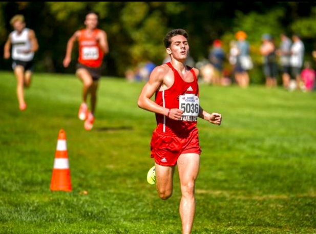 Lyons pushing through the final steps of his race.