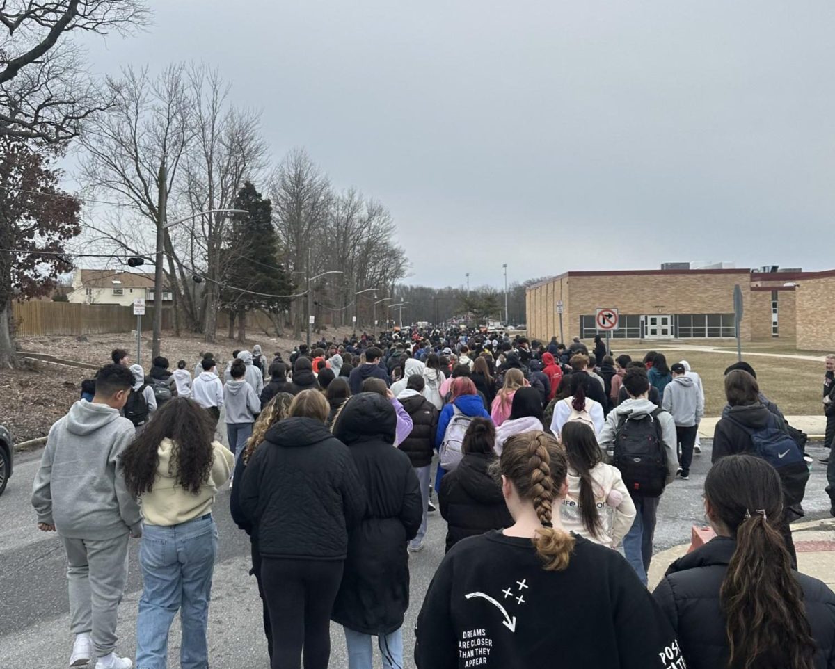 East students walk to the stadium following an evacuation order. 