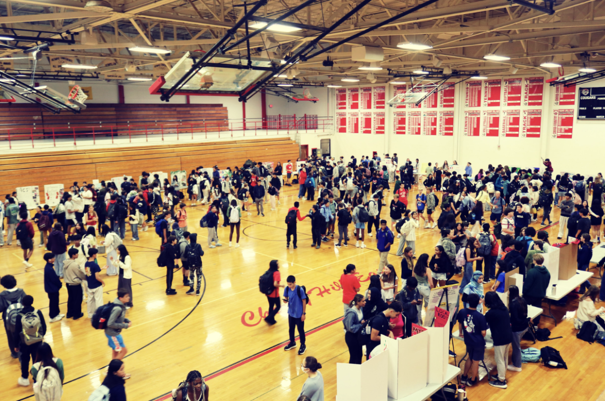 Clubs gather in the Dibart Gym for the activities fair. 