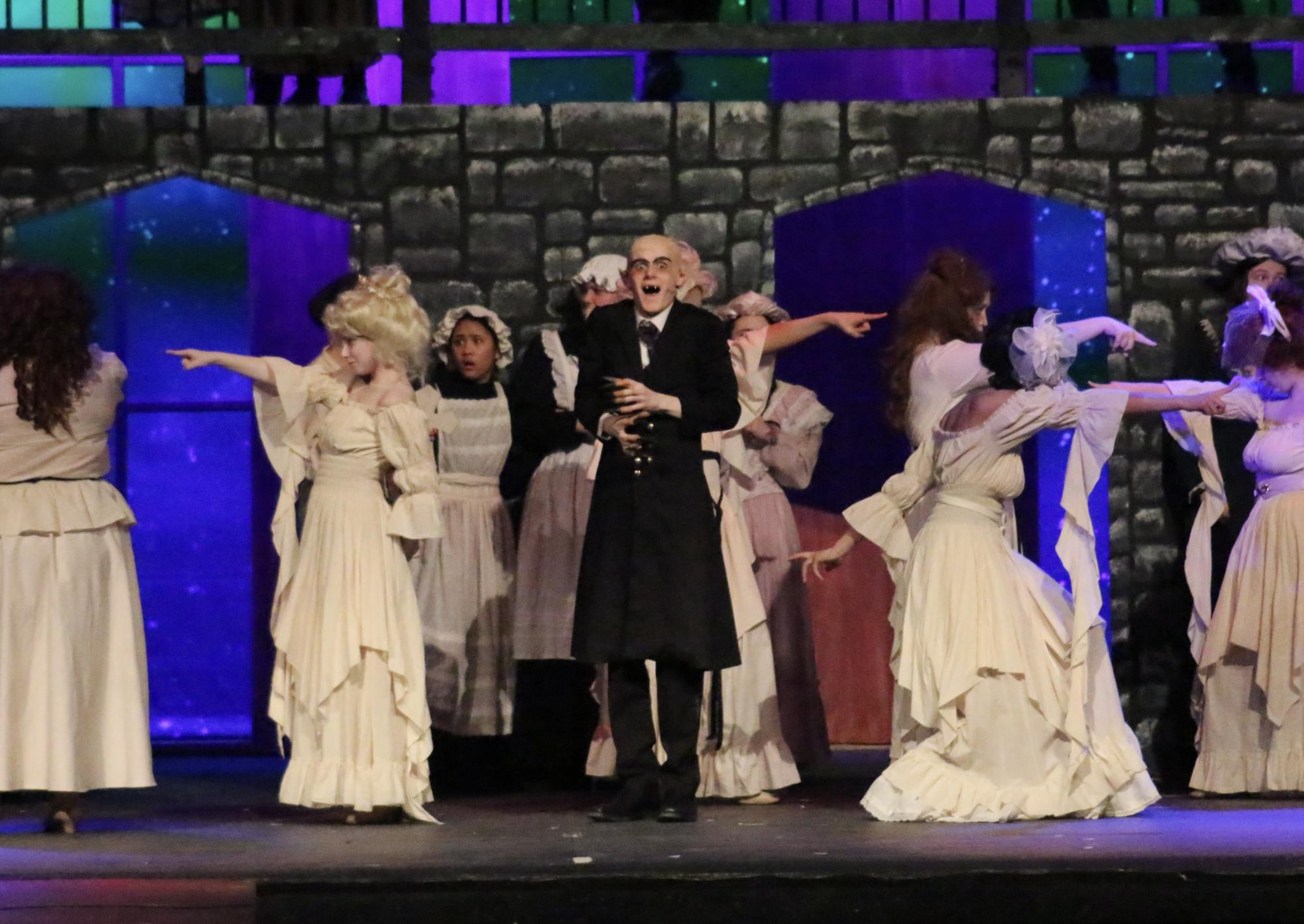 Dracula, Justin Malec (‘26), laughs maniacally before his final dance number with the Draculettes.
