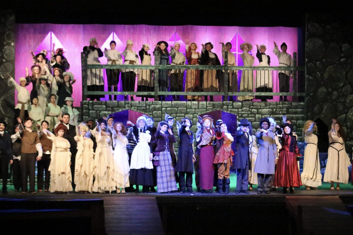 Troupe 213 thank the audience during curtain call.
