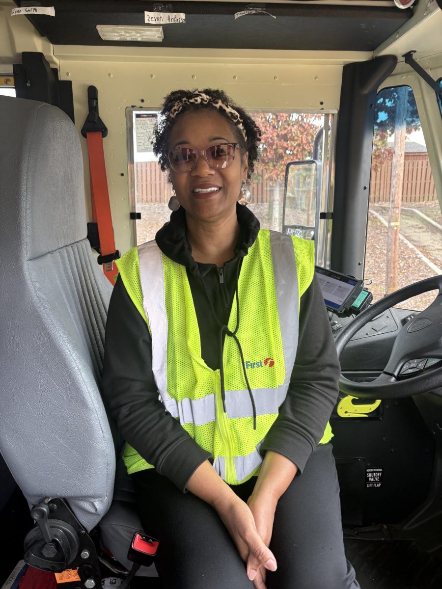 Sharon Frisby seated at her wheel.