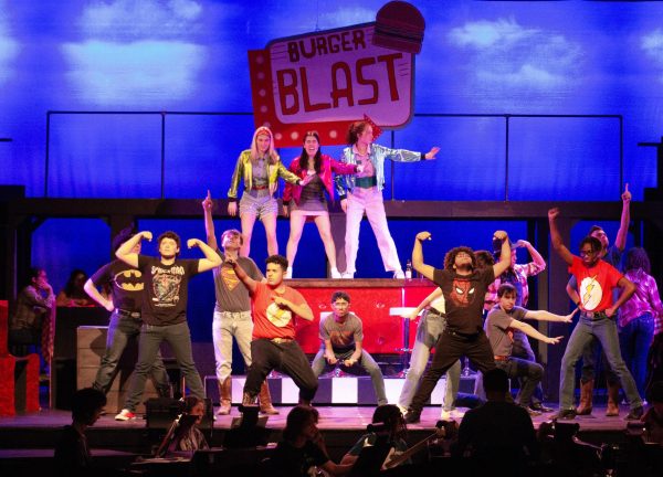 Ariel Moore, played by Daddis, and her friends sing "Holding Out for a Hero" with the ensemble.
