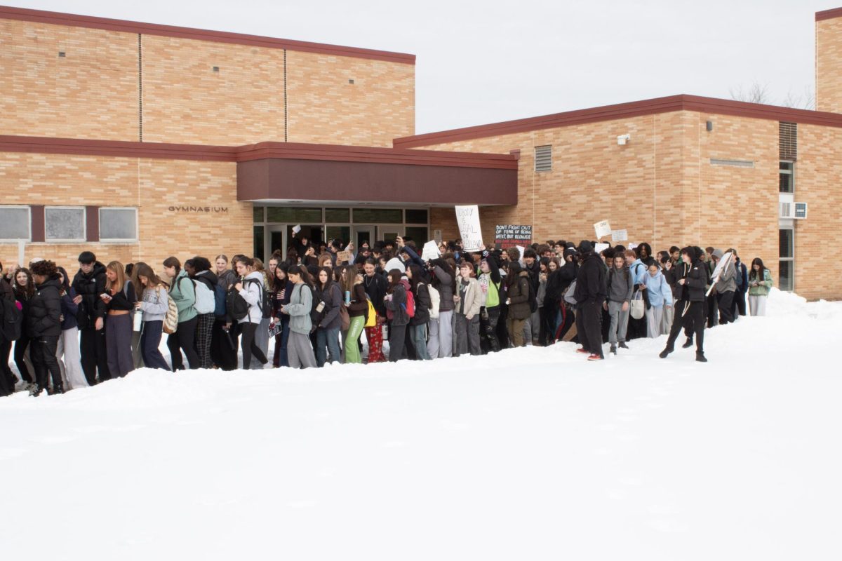 Students walk out of the East Gym.