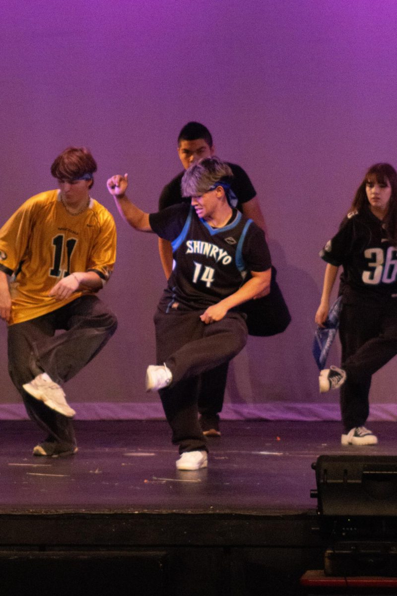 Nathan Aguelo ('26) dances to "Pauwi Nako" by O.C. Dawg during the FCS performance. 