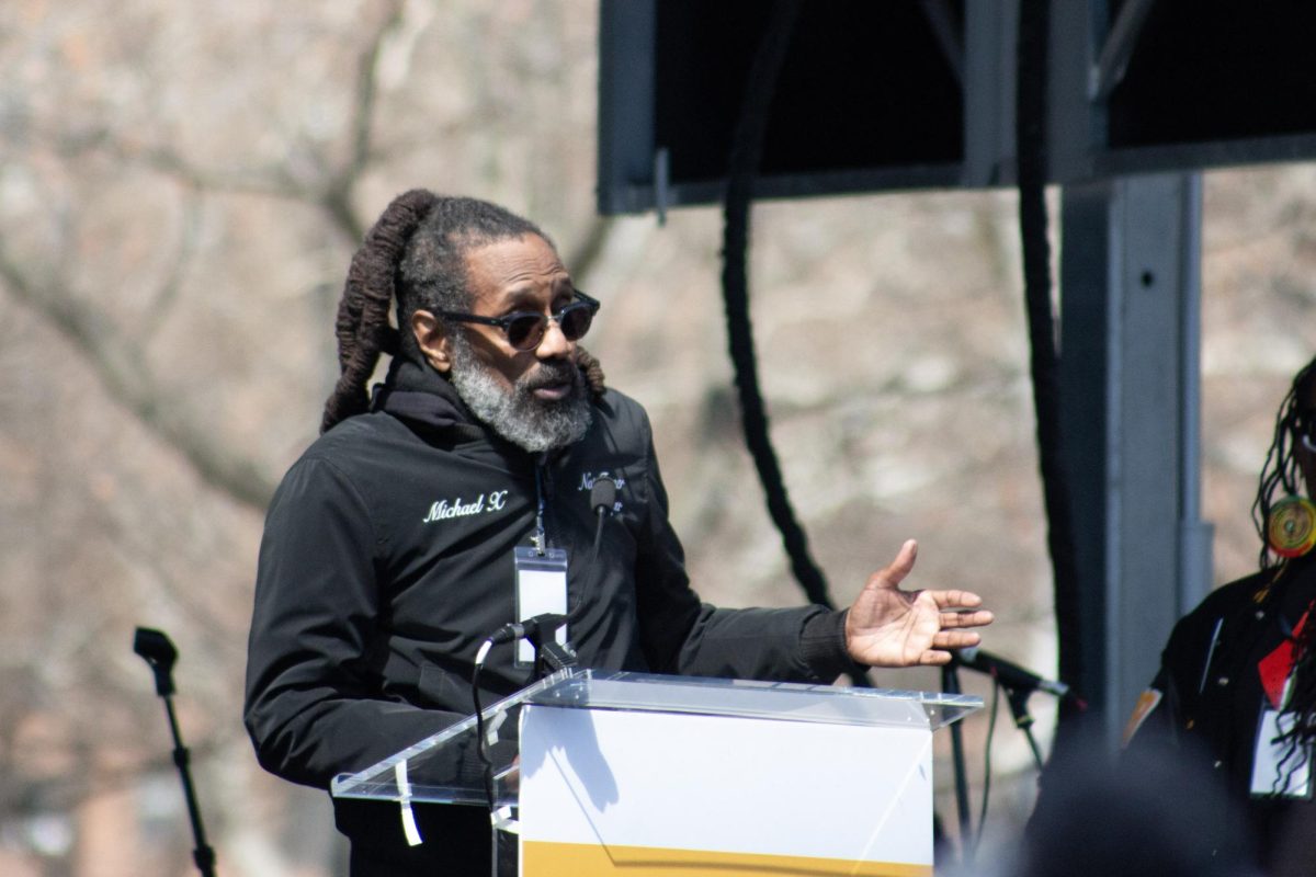Avenging the Ancestors Coalition founding member Michael Coard speaks at No Kings Philadelphia.