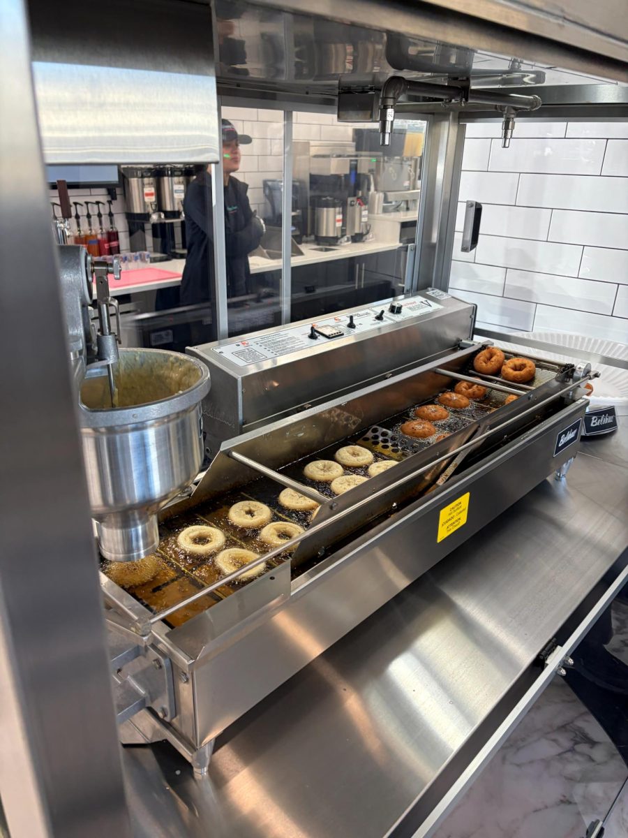 Donuts sizzle as they are being made. Used with permission from Jessica Buono. 