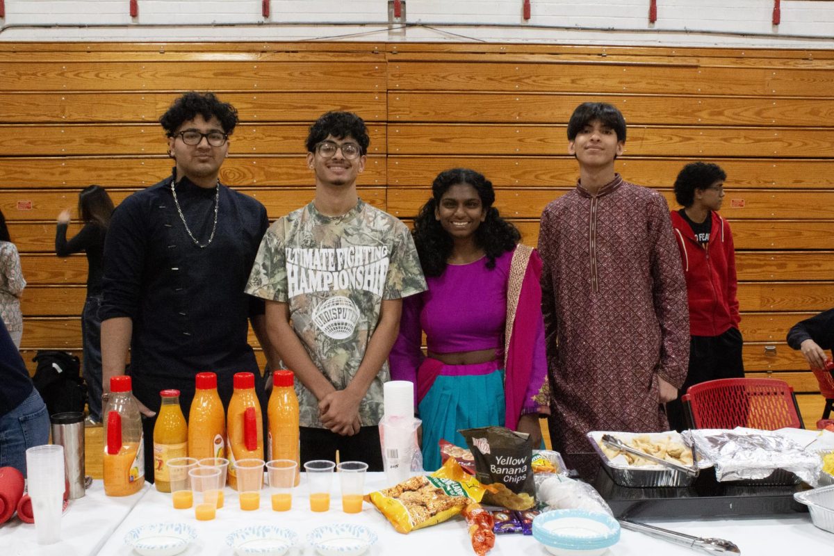 Booth members of the Indian Cultural Society pose for a photo.