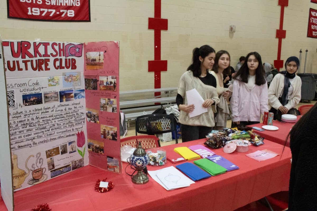 The Turkish Culture Club's booth offers Turkish candies to students.