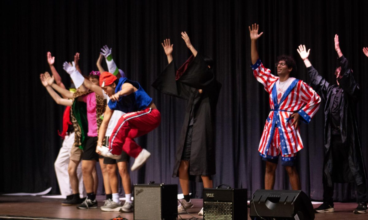 Mr. Buco performs a dance sequence in the opening act of Mr. East.