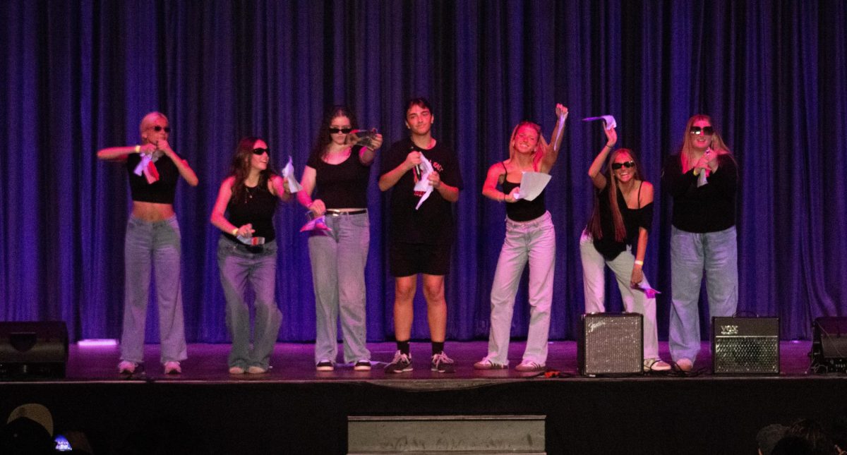 Mr. Hendy Sendy rips up his diss track with the other members of his act.