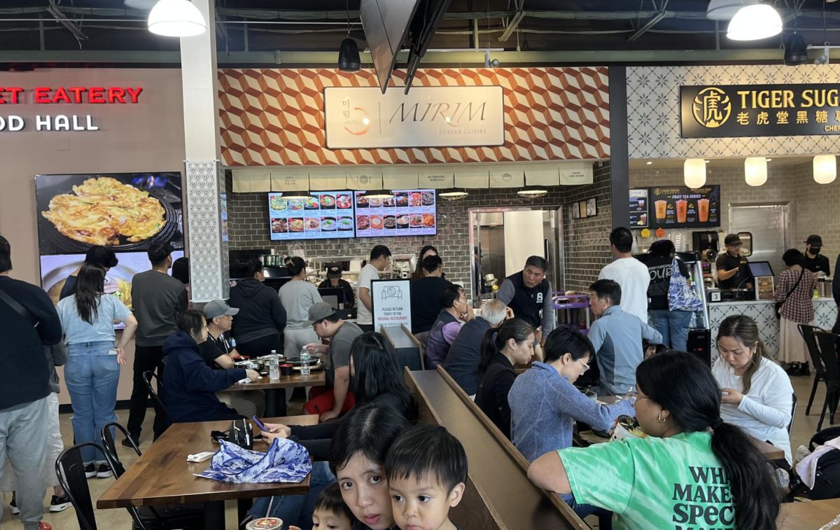 A long line emerges in front of Mirim as countless shoppers wait to order authentic Korean cuisine.
