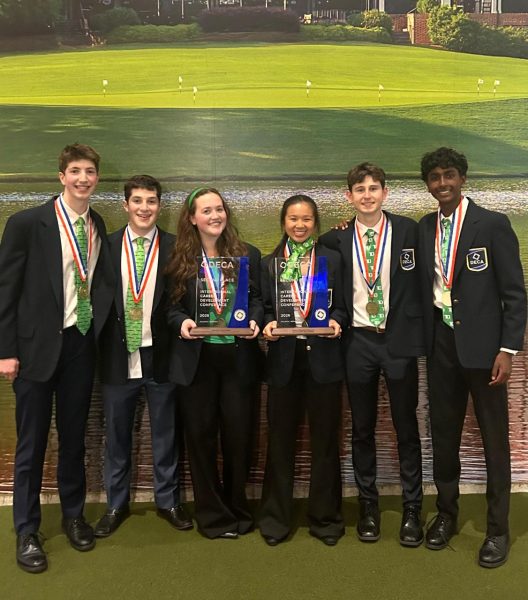 Cary Bloom ('26), Jake Forstadt ('26), Alexis Nowakowski ('26), Tracy Vuong ('26), Ben Sautter ('26) and Aneesh Rajagopal ('27) pose with their second place award. Used with permission from Kaushik Rachuri ('26).